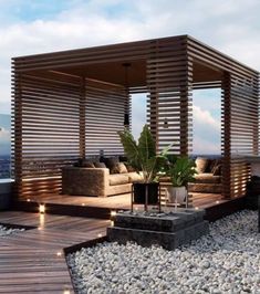 an outdoor living area with wood slats