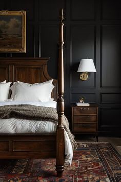 a large bed sitting in a bedroom on top of a rug