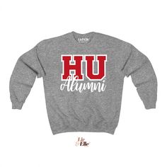 HU™ Howard University Alumni SweatshirtOfficially licensed collegiate apparel Design: A premium raised flock design adds dimension and a soft, suede feel to this custom sweatshirt. Colors:• Navy Blue (red text/white outline)• Ash Grey (red text/blue outline)• Heather Grey (red text/white outline) Discover More Licensed Howard University Apparel Celebrating Black excellence. Building legacy.Join the scholar community: @BlackandScholared Collegiate Apparel, University Apparel, Sweatshirt Colors, Howard University, Heat Transfer Design, Custom Sweatshirts, Black Excellence, Ash Grey, Apparel Design