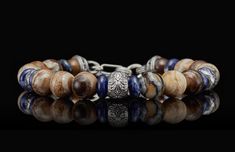 Boots and Denim Woolly Mammoth Tooth Men's Bracelet | William Henry Luxury Beaded Bracelets With Natural Stones, Elegant Brown Agate Bracelets, Elegant Brown Bracelets With Large Beads, Elegant Agate Bracelets With Polished Beads, Walrus Tusks, Molar Tooth, Sea Floor, William Henry, Wooly Mammoth