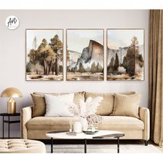 three paintings hanging on the wall above a couch in a living room with beige furniture