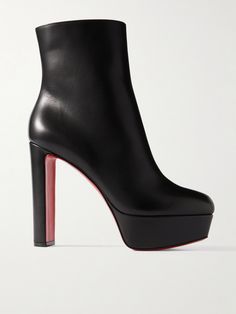 Christian Louboutin's 'Movida' ankle boots are set on towering 130mm heels balanced by 40mm platforms. They've been made in Italy from supple black leather and kick up to reveal the iconic red soles when you walk. Show them off with midi and mini hems. 130mm Heels, Boots 2024, Louboutin Boots, Designer Ankle Boots, Bootie Heels, Christian Louboutin Boots, Patent Leather Boots, Louboutin Heels, Shoes Boots Ankle