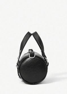 Expertly crafted from eco-leather, this black cylinder bag boasts a stylish buckle decoration. With a convenient shoulder strap and secure zipper closure, it offers both functionality and sustainable materials. Elevate your fashion game while reducing your environmental impact. Material: Polyurethane Black Round Case Bags For Everyday Use, Black Round Case Bag For Daily Use, Cylinder Bag, Leather Buckle, Environmental Impact, Sustainable Materials, Fashion Games, Shoulder Strap, Buckle