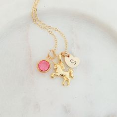 Personalised Little Unicorn Necklace, Birthday Gift for Little Girl, Daughter Gift, Gift for Niece, Toddler Gift, Granddaughter Gift ❤ Available in silver and gold. ❤ Specification . Chain and components are 925 Sterling Silver or 14K Gold Filled . Unicorn is 925 Sterling Silver or Gold Vermeil with size 10mm x 15mm . Disc size is 7mm . Length includes jump ring and clasp . Comes in our signature pouch ready for gift giving ❤ All collections from StampedEve: https://www.etsy.com/au/shop/StampedEve?ref=hdr_shop_menu IMPORTANT Usually jewellery in the pictures looks bigger than in reality. Please consider all given dimension and compare them to the ruler before ordering. ❤ About My Jewellery Each piece of jewellery of my shop is handmade and therefore unique - no two items going to look exac Unicorn Necklace, Granddaughter Gift, Unicorn Gifts, Daughter Gifts, Toddler Gifts, Hand Stamped, Charm Necklace, My Jewellery, Birthday Gifts