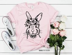 Listing: (1) Easter Rabbit Shirt with Floral Accents. Main Sample Photo 1: Pink shirt with black lettering. Following Listing Photos: Lilac and Mint shirt with black lettering for the designs. *Tops are not pre-knotted. Any knotting is only shown for styling purposes. Branding: Adult: Bella Canvas/Next Level Youth: Bella Canvas/Next Level *All sizing is unisex. *Size charts are available in the photos section Turn inside out wash on gentle & dry on low. I use high quality cotton tops & bodysuits Rabbit With Flowers, Pink Short Sleeve T-shirt For Easter, Mint Shirt, Easter Pink Cotton T-shirt, White Cotton T-shirt With Bunny Design, Spring Casual T-shirt With Bunny Design, Spring Cotton T-shirt With Bunny Design, Old Outfits, Aesthetic T Shirts