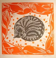 an orange and white print with a black cat on it's head in the center