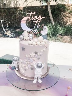 a birthday cake with stars and moon decorations