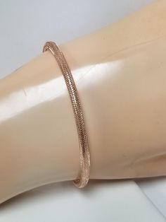 "Thanks for shopping our vintage estate store. We tend to sell well below wholesale and truly hope you enjoy all of our items. Many of the items are one of a kind, so please enjoy scrolling through the pictures and hopefully something will catch your eye. Black spots are from reflections or camera. Beautiful estate 14k rose gold stretch mesh bangle cuff diamond cut rounded design. Stunning bracelet. Size: 2.25\" by 2.25\" Width: 3.5mm 1/4\" Diam: 8\" or more Thickness: 1.5mm Weight: 1.20 grams M Classic Hallmarked Rose Gold Bracelet, Hallmarked Rose Gold Bangle For Formal Occasions, Anniversary Rose Gold Hallmarked Bracelet, Bracelet Bangle, Black Spot, Eye Black, Diamond Cut, Bangle Bracelets, Diamond Cuts