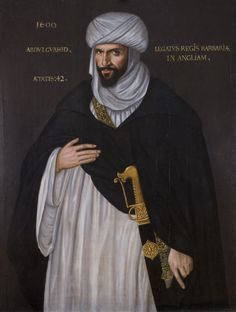 an oil painting of a man in black and white robes with a golden key on his left arm