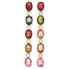 18ct Yellow Gold 18ct Tourmaline & 0.80ct Diamond Drop Earrings Elevate your elegance with our Pair of Pre-Loved 18ct Yellow Gold Tourmaline & Diamond Drop Earrings, a mesmerising cascade of vibrant colours and scintillating diamonds. Each earring features a delightful arrangement of five oval-cut, mixed-colour tourmalines in varying shades of pinks, browns, and greens. The colourful tourmalines create a captivating play of hues, evoking the beauty of nature's palette, and are elegantly accentua Bezel Set Diamond, Diamond Drop Earrings, Diamond Drops, Vibrant Colours, Oval Cut, Everyday Look, Colored Diamonds, Tourmaline, Mood Board