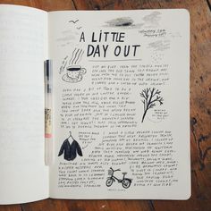 an open book with drawings and writing on the pages that read a little day out