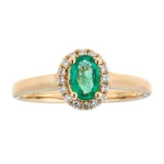 Showcasing a large prong-set oval Emerald, this Gin & Grace ring issurrounded with sixteen round-cut white diamonds. This eye-catchingring is crafted of 10k Yellow gold jewelry, creating a subtle blush. Gemstone colors: Green Gemstone shapes: Oval One prong-set oval-cut Emerald measures 4X6 Gemstone weight: 0.40 carat Total gemstone weight: 0.40 carat Diamonds: 16 Diamond cut: Round-cut Diamond measurements: Each measures 1 mm Diamond weight: 0.13 carat Color: G-H Clarity: I1-I2 Setting: Pro Oval Diamond Cluster Ring With Prong Setting, Oval Diamond Halo Ring Fine Jewelry, White Gold Emerald Ring With Diamond Accents, Oval Shape, Oval Emerald Ring In White Gold With Diamond Accents, 14k Gold Oval Halo Ring With Brilliant Cut, Oval Emerald Ring With Diamond, Oval Emerald Ring With Diamond Accents For Formal, Oval Emerald Ring With Diamond Center Stone, Oval Yellow Gold Emerald Ring With Halo