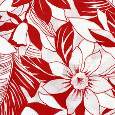 a red and white floral print fabric with large, leafy flowers on the side