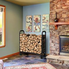 a living room filled with furniture and a fire place in front of a stone fireplace