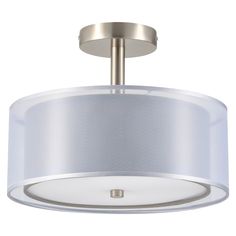 a light fixture with a white shade on the drum and a round metal frame around it