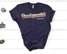 Colorful Developmental Therapy Shirt, DT Assistant Tshirt, Play is Life Changing Developmental Therapy Shirt - Unisex T Shirt, Women Racerback Tank, Long Sleeve T-Shirt Tees Tshirt Sweatshirt Sweater Hoodie Gift For Men Women Boys Girls Well, let's say goodbye to all this boring apparel... The GodBlessThisDesign team creates custom clothes with great designs to suit all tastes. Our unique and blessed designs are a blast fit for every occasion and always a perfect fit... We combine our beautiful Physical Therapy Shirts, Occupational Therapy Shirts, Therapy Shirt, Therapy Gift, Occupational Therapist, Special Education Teacher, Awareness Shirt, Occupational Therapy, T Shirt Women