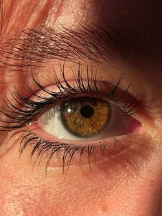 an extreme close up shot of someone's eye