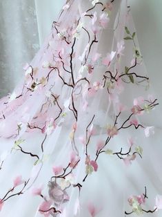 "Pink petals and brown branches embroidered on pink tulle, wear a dress made of it and you will look sweet and beautiful. Listing is for one yard. Measurement (approx): 53.1\" in width (135 cm) Qty: 1 yard ( Additional quantities are available.) DIY homemade fabric, Wedding, Bridal dress, Ribbon flowers, jewelry design, doll clothes, Cake, dolls, hang adorn, bra decoration, small parts, home decor... and so on, or any other crafts you like. Wholesale Acceptable ---------------------------------- Cherry Blossom Wedding Dress, Branches Embroidery, Pink Tulle Fabric, Sakura Wedding, Cherry Blossom Wedding, Bridal Applique, Pink Petals, Pink Tulle, Tulle Fabric