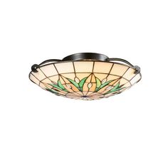 a ceiling light that has a flower design on the glass and is hanging from it's side