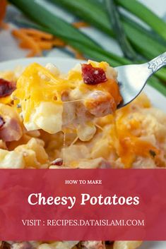 cheesy potatoes on a plate with a fork