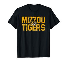 PRICES MAY VARY. Officially Licensed University of Missouri apparel. Show your support for the Tigers with this Mizzou logo apparel! The soft material and digitally printed logo make this a great addition to any Missouri Tigers apparel collection! The Zou! Wear this fan favorite Missouri Tigers apparel to the big game or just hanging out around the house. The unique vintage logo will let everyone know your affiliation with Mizzou! Lightweight, Classic fit, Double-needle sleeve and bottom hem Mizzou Tigers Logo, University Merchandise, Towson University, Mizzou Tigers, Tiger Logo, Missouri Tigers, University Of Missouri, Tiger T Shirt, Clothing Logo