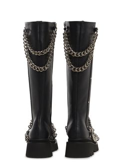 These combat boots have a vegan leather construction, tiered swooping chains on the top and front, O-ring detailing, stud detailing, front lace-ups, and side zipper closures. Shoes Platform Boots, Demonia Shoes, Boots Combat, Layered Chain, Pride Outfit, Shoes Platform, Layered Chains, Cowgirl Outfits, New Dolls