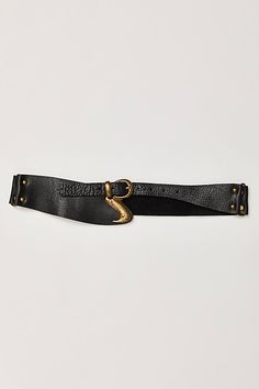 Designed to add an effortlessly essential touch to absolutely every outfit, this so cool hip belt is featured in a luxe leather fabrication and asymmetric style with defined metal buckle at center for a super cool finish. | Hampton Hip Belt by Free People in Black, Size: S/M Edgy Leather Belt, Edgy Leather Belts With Belt Loops, Chic Leather Belt With Brass Buckle, Chic Black Belt Buckles With Brass Detail, Chic Black Belt Buckles With Brass Buckle, Chic Black Belt With Brass Buckle, Chic Adjustable Belt With Brass Buckle, People Logo, Hip Belt