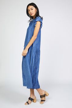 This jacquard maxi dress feels particularly breezy thanks to the dropped waist and shin-skimming pleats. Done in Parisian blue with a floral motif woven in, it's got a sweetly tied neckline, smocked detailing, and tiered short sleeves edged by picot stitching. "•Split neckline with self-tie •Relaxed fit •Ruffle trim •Short sleeves •Dropped waist •Pleated skirt •Mid-length hem DIMENSIONS •Standard: 50 Length" Item number 2090410-1 100% Polyester Hand Wash Cold Blue Short Sleeve Pleated Maxi Dress, Blue Pleated Hem Summer Dresses, Blue Summer Dress With Pleated Hem, Blue Pleated Hem Dress For Summer, Casual Blue Pleated Maxi Dress, Blue Maxi Dress For Daywear, Blue Ruffle Hem Maxi Dress, Blue Maxi Dress With Ruffle Hem, Blue Maxi Dress With Ruffle Hem For Daywear