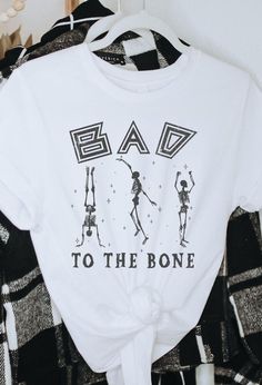 Details White in color Dancing Skelton Bad to the bone Bone Costume, Witch Graphic, Fall Graphic Tee, Mom Graphic Tees, Mama Hoodie, Fall Graphic, Country Music Shirts, Mom Hoodies, Trendy Mom