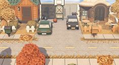 an image of a street scene with cars and pumpkins on the ground in front of houses