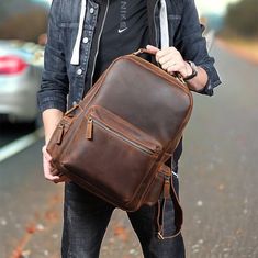 Explore durable leather backpacks for men, ideal for travel adventures. Stylish and practical designs for your on-the-go lifestyle. - Free shipping on all our leather backpacks - Unisex Backpack - Crafted from unique full grain cowhide leather, also known as crazy horse leather - Vintage brown color - Main compartment features a padded pocket for laptop - Antique Brass Hardware and YKK Zippers - Cotton lining with soft surface processing - Soft texture and brown color - Size: 15.4 inch * 4.8 inch * 11.2 inch - Two open pockets for smartphone or keys - Zippered pocket for wallet or valuables - Dedicated computer compartment for 15' laptop with velcro closure - Approximately ten business days processing time - Each leather backpack is unique; variations from pictures should be expected. Beho Backpack Craft, Hipster Backpack, Leather Travel Backpack, Laptop Travel Bag, Leather Backpack For Men, Laptop Bag For Women, Unisex Backpack, Computer Bag, Back Bag