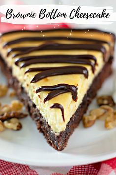 a piece of chocolate cheesecake on a white plate with walnuts around the edge