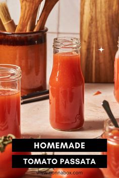 homemade tomato sauce in glass jars on a table