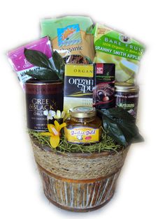 a basket filled with lots of different types of food and condiments in it