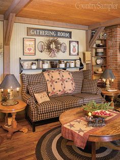 a living room filled with furniture and a fire place