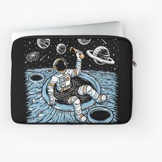 an astronaut floating on the surface of space with saturn in the background laptop sleeve,