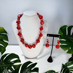 Beautiful Coral and Agate Necklace Set.  Set consist of chunky Red Coral natural beads, paired with Fire Agate Gemstones.  Earrings feature a coral bead, hematite spacer, and an Agate bead.  Necklace 18 inches Red Agate Beaded Necklaces With Round Beads, Red Agate Beaded Necklace With Gemstone Beads, Red Agate Jewelry With Natural Stones, Red Carnelian Jewelry With Faceted Beads, Red Carnelian Beaded Necklace With Faceted Beads, Red Carnelian Faceted Beaded Necklaces, Red Czech Glass Jewelry With Natural Stones, Red Beaded Agate Jewelry, Red Agate Beaded Jewelry