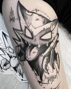 a black and white tattoo on the leg of a person with a clock in it