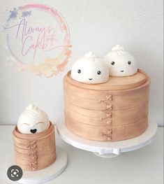 there are two cakes that have been made to look like they are sleeping on top of each other