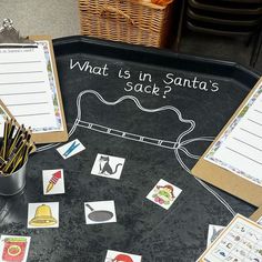 what is in santa's sack? on a blackboard with matching cards and pencils