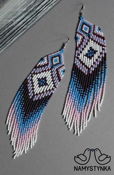 two pairs of beaded earrings with blue, pink and white fringes on them