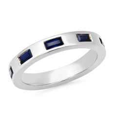 We just love a pop of blue, and the 14K Gold Stationary Blue Sapphire Baguette Ring adds that hint of color your wardrobe has been asking for. Featuring gorgeous Blue Sapphire baguettes set into a shiny gold band, this ring stacks with others and looks beautiful on its own - you really can't go wrong!Pair our Stationary Blue Sapphire Baguette Ring with our Blue Sapphire Domed Ring. 0.99 carats SBR59-YG-BS All sales are final. Elegant Blue Stackable Rings For Formal Occasions, Modern Blue Rings With Baguette Diamonds, Modern Blue Sapphire Baguette Cut Ring, Modern Rectangular Blue Sapphire Ring, Modern Blue Baguette Cut Ring, Modern Blue Rectangular Sapphire Ring, Sapphire Baguette Ring, Ring Stacks, Diamond Stacks