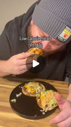 a man is eating some food on a plate with the words low calorie meals pt 40