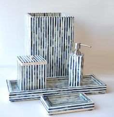 a bathroom set consisting of blue and white stripes