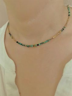 Very delicate and elegant faceted African turquoise necklace choker  with high quality 18k. gold plated  chain and high quality  tiny hematite beads ( don't change color) This necklace is perfect for layering.      Neclace assembled on a very durable jewelry wire.      Necklace length-15.3 in.+2 in.  extension chain     Nickel-free stainless steel lobster clasp.  Excellent gift idea for women. Gold Chain Beaded Necklace, Gold Turquoise Necklace With Round Beads, Adjustable Gold Turquoise Necklace With Round Beads, Dainty Gold Crystal Necklace With Colorful Beads, Gold Dainty Crystal Necklace With Colorful Beads, Gold Gemstone Beads Choker Jewelry, Gold Choker With Gemstone Beads As Gift, Gold Choker With Gemstone Beads For Gift, Gold Crystal Choker Necklaces With Gemstone Beads