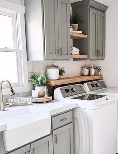 a washer and dryer in a small kitchen