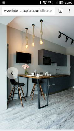 the kitchen is clean and ready to be used as a dining room or living room