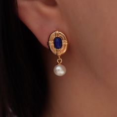 "Introducing our exquisite Dainty Lapis Lazuli Earrings with Pearl Drops, inspired by the elegance of the Victorian era. These delicate earrings are crafted from high-quality sterling silver and feature stunning lapis lazuli gemstones paired with graceful pearl drops. With their timeless charm and intricate design, they make for the perfect Christmas gift, sure to delight and enchant. Elevate your style with these dainty earrings that effortlessly combine vintage allure and modern sophistication. DETAILED DESCRIPTION// EARRINGS: Material: 925 sterling silver  Finish: 18k gold  Stone: Natural blue Lapis lazuli and freshwater pearls (As they are crafted with natural stones, each one may have slight differences.) Lapis lazuli size:4*6mm Freshwater pearls size: 6mm NECKLACE: Material: 925 ster Lapis Lazuli Earrings Gold, Elegant Blue Cabochon Earrings, Formal Yellow Gold Jewelry With Lapis Lazuli, Formal Yellow Gold Lapis Lazuli Jewelry, Elegant Cabochon Pearl Drop Earrings, Elegant Sapphire Jewelry With Cabochon, Formal Lapis Lazuli Jewelry, Gold Lapis Lazuli Pierced Earrings, Gold Pierced Earrings With Lapis Lazuli