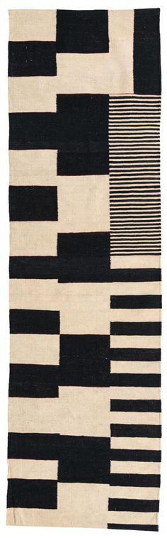 a black and white rug with stripes on it