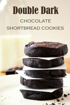 double dark chocolate shortbread cookies stacked on top of each other